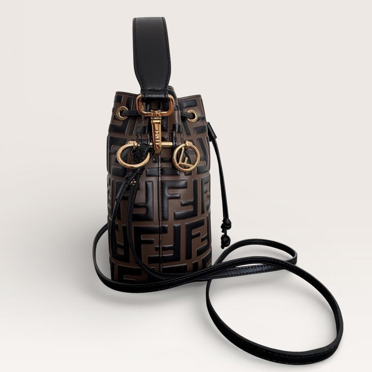 Fendi Mon Tresor Mini Bucket Bag in Brown FF Embossed Leather