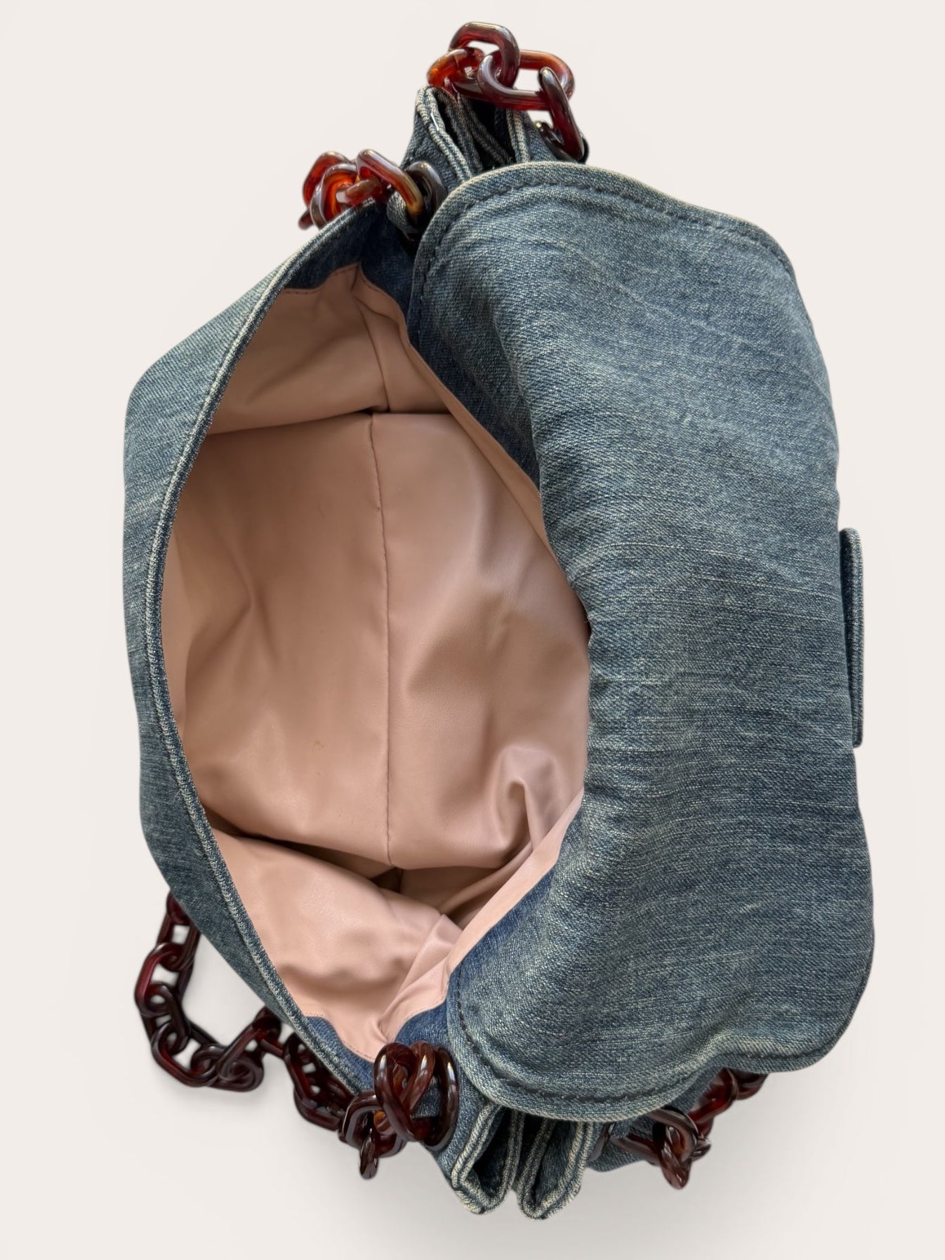 Interior of back pocket Prada bag