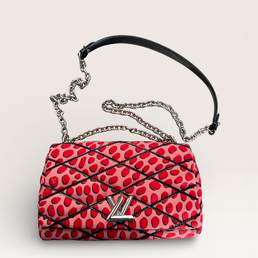 Louis Vuitton LV Twist Jungle Dot Canvas shoulder crossbody bag in pink and red dots crossbody lay flat view