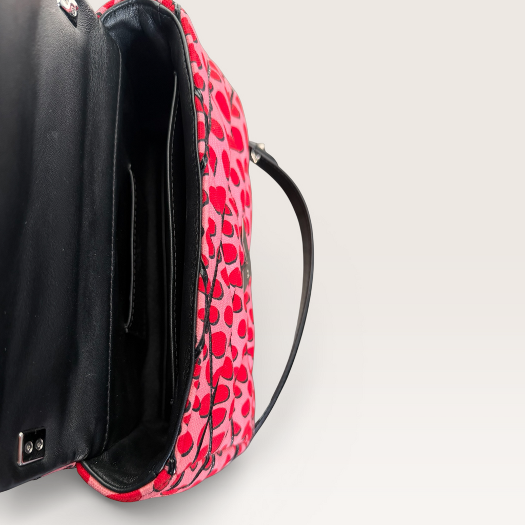 Louis Vuitton LV Twist Jungle Dot Canvas shoulder crossbody bag in pink and red dots interior view