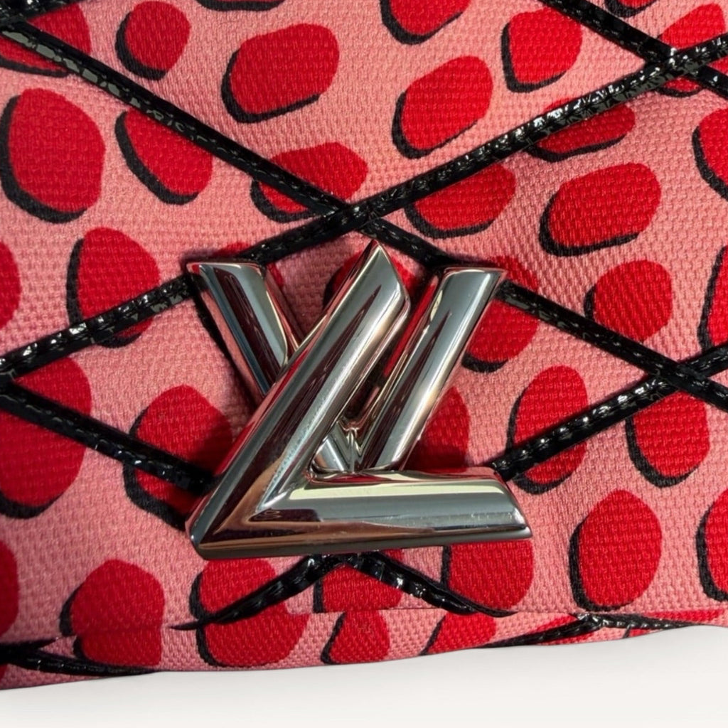 Louis Vuitton LV Twist Jungle Dot Canvas shoulder crossbody bag in pink and red dots LV Twist logo 