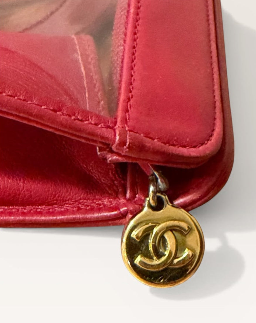 Closeup of zipper pull Chanel clutch