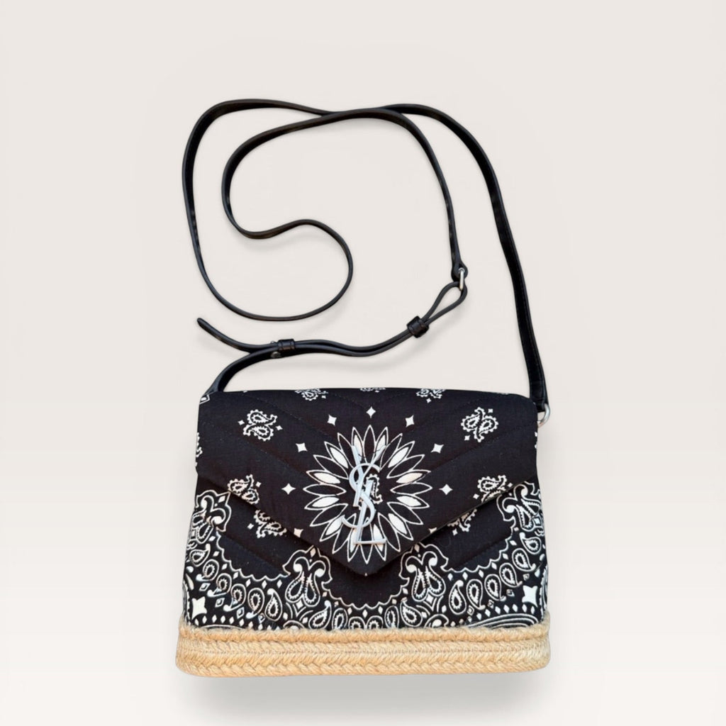 Saint Laurent bandana canvas espadrille crossbody bag in black and white with YSL logo front view laying flat