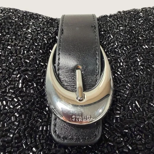 buckle of Staud beaded bag