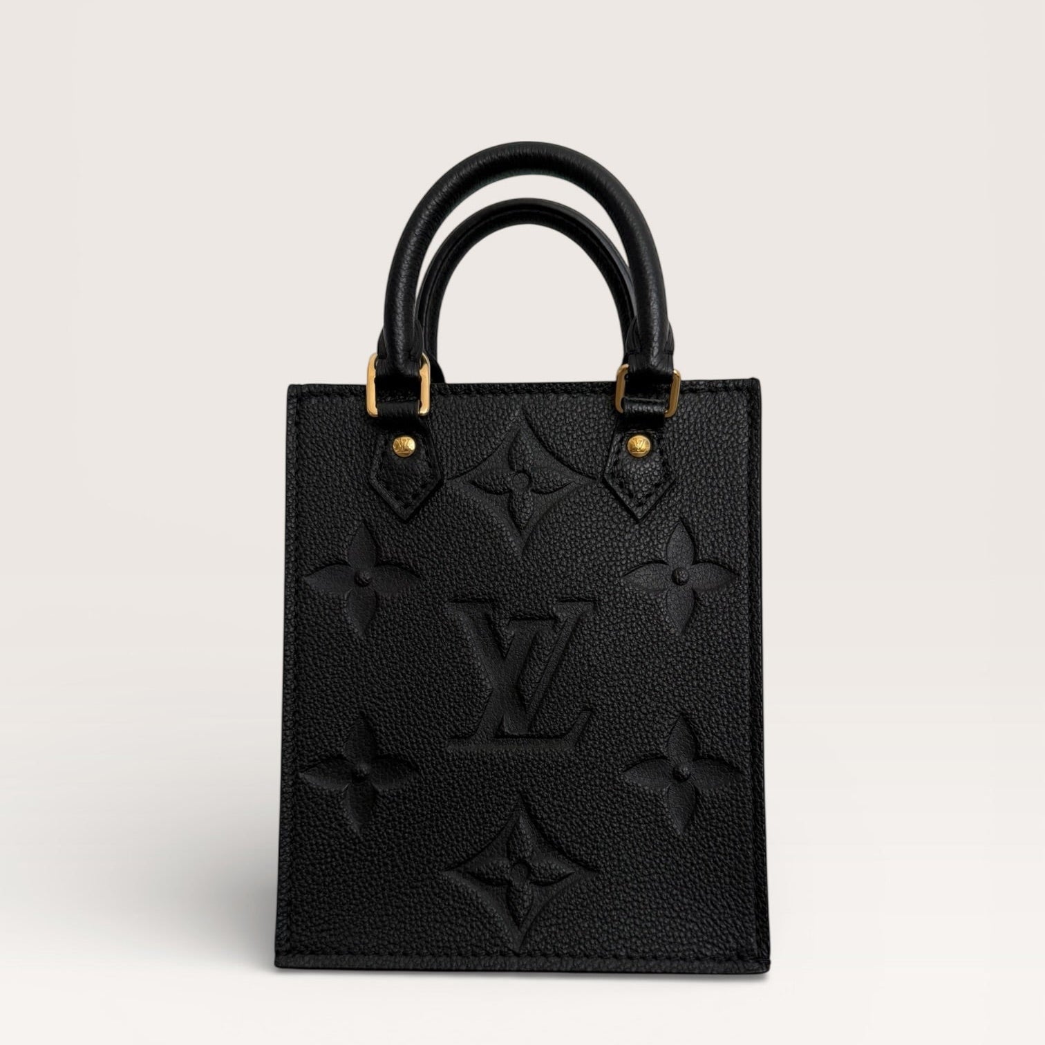 Louis Vuitton petit sac plat black empreinte mini tote back view 