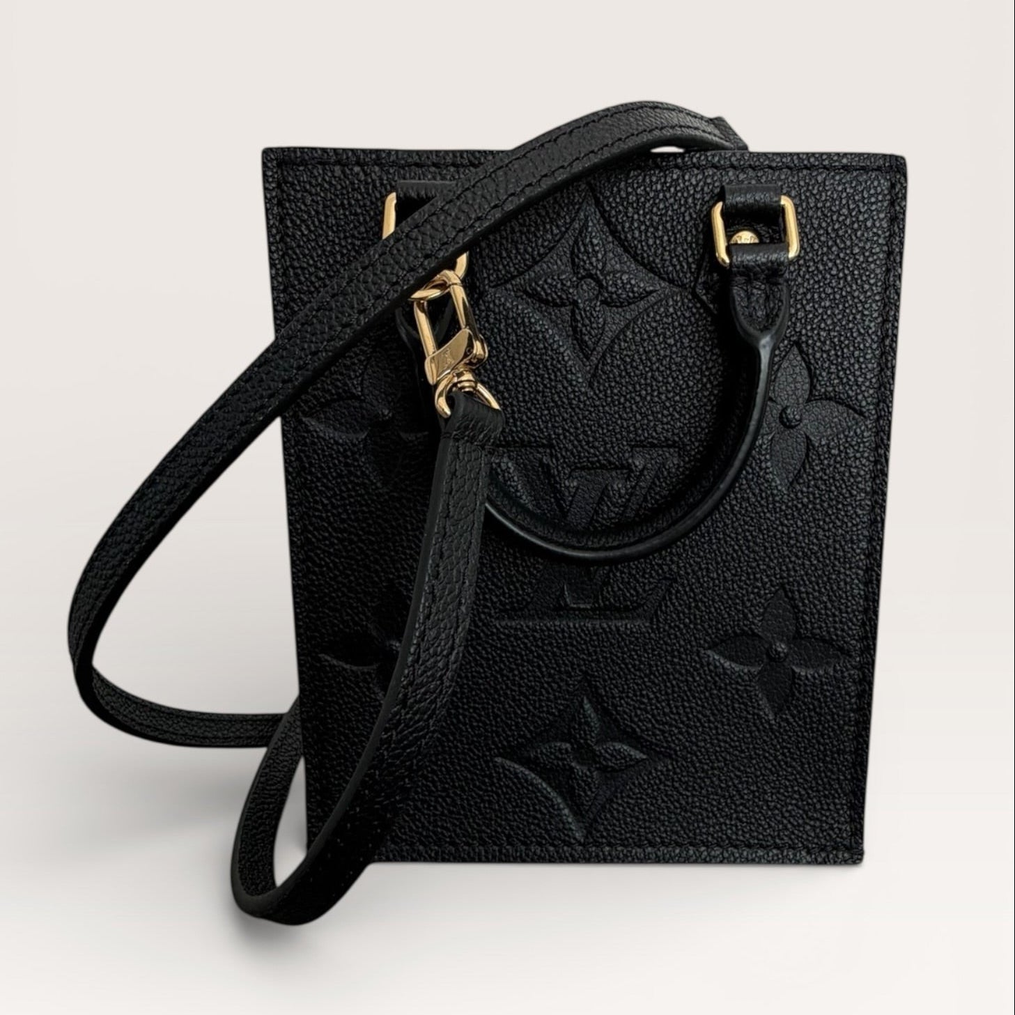 Louis Vuitton petit sac plat black empreinte mini tote front view with  trap