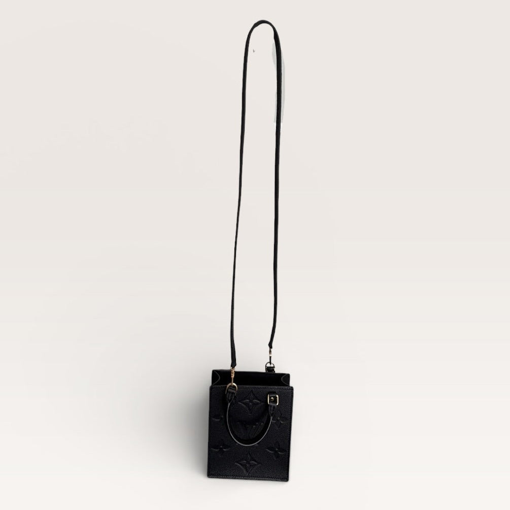 Louis Vuitton petit sac plat black empreinte mini tote front view with strap 