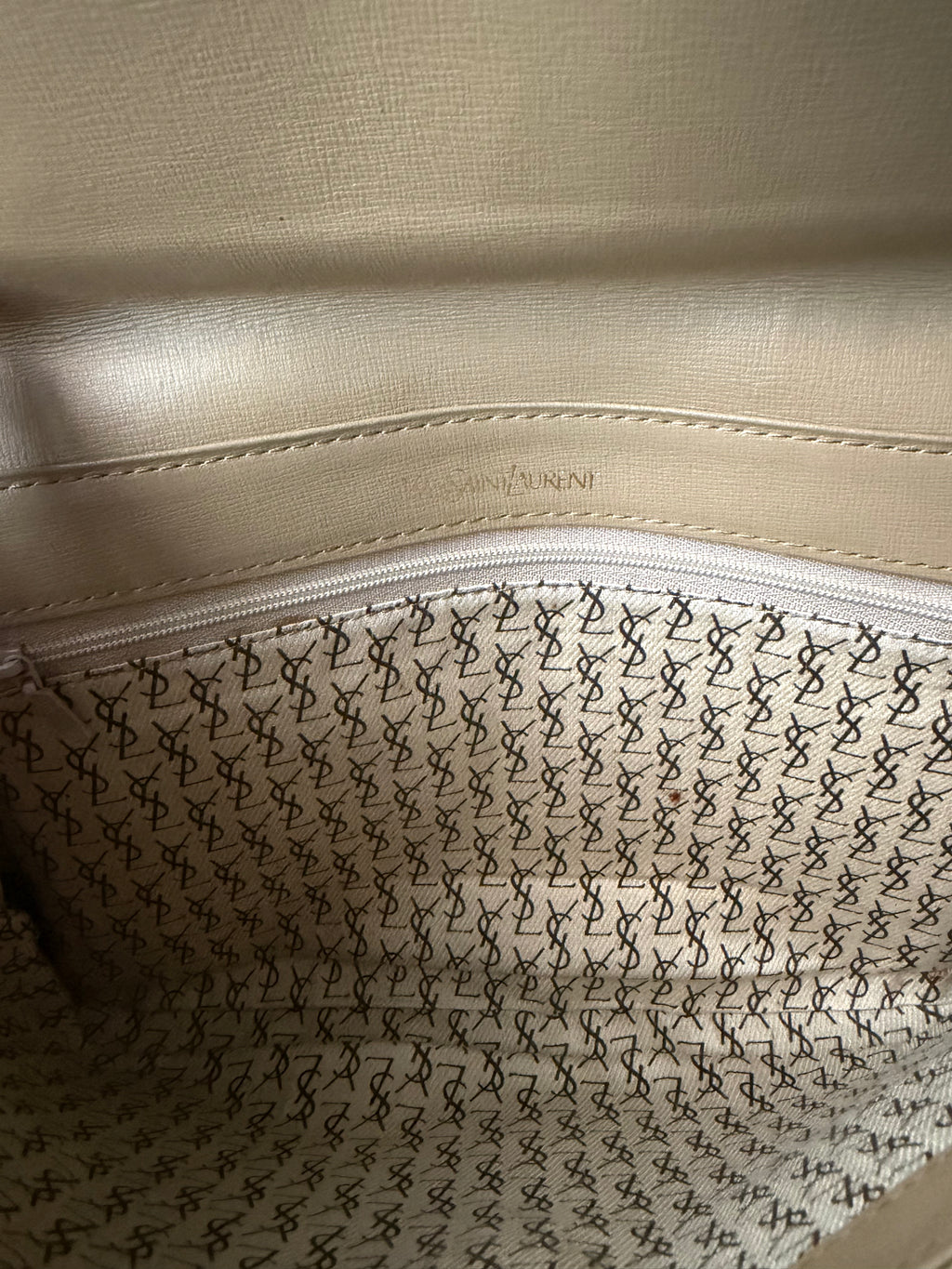 YSL vintage printed clutch bottom view Of interior